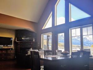 a living room filled with furniture and a window at PRC Annex - Pet Friendly in Canmore