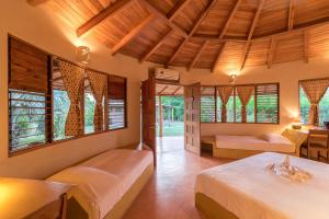 Voodi või voodid majutusasutuse Hotel Playa Negra toas