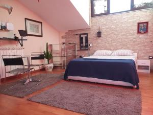 Voodi või voodid majutusasutuse Welcome B&B Lodi toas