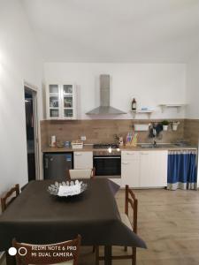 Kuchyň nebo kuchyňský kout v ubytování AGRITURISMO " LE SERRE" + 36 fotografií