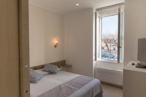 Ein Bett oder Betten in einem Zimmer der Unterkunft Casa Jaume