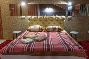 Postel nebo postele na pokoji v ubytování Hotel UNENEGE