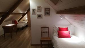 Postel nebo postele na pokoji v ubytování Gîte sainte Famille