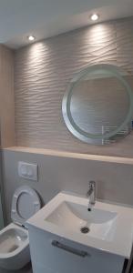 Kúpeľňa v ubytovaní Apartman Jopa