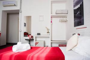 Posteľ alebo postele v izbe v ubytovaní Relais Cola Di Rienzo