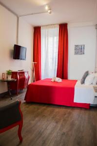 Posteľ alebo postele v izbe v ubytovaní Relais Cola Di Rienzo