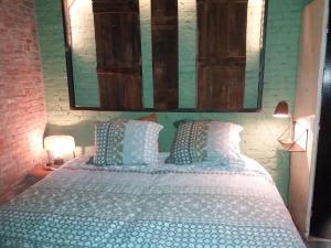 Postel nebo postele na pokoji v ubytování B&B LoFt 21