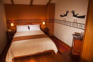 Llit o llits en una habitació de Eureka San Blas