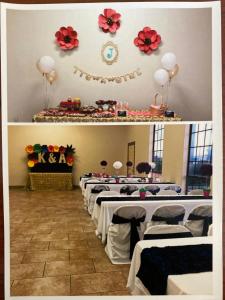 a row of tables in a room with flowers on the wall at Los Fresnos Inn and Suites in Los Fresnos