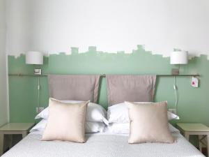 Postel nebo postele na pokoji v ubytování Laurus Sicilian Holiday