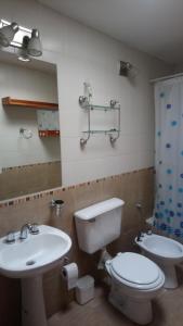 Ένα μπάνιο στο Departamento Ananda