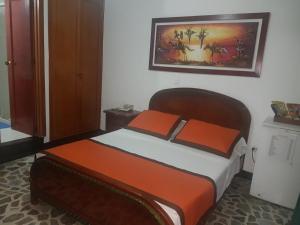 Letto o letti in una camera di Hotel Tequendama