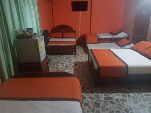 Letto o letti in una camera di Hotel Tequendama