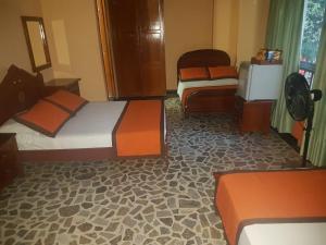 Letto o letti in una camera di Hotel Tequendama