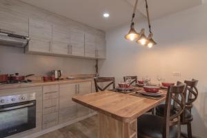 Dapur atau dapur kecil di Etnias Apartments