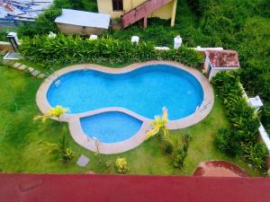 an overhead view of a swimming pool in a yard at Zalor Residency 2 in Varca