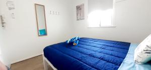 Postel nebo postele na pokoji v ubytování Mumma's Hostel Surfers Paradise
