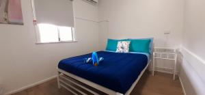 Postel nebo postele na pokoji v ubytování Mumma's Hostel Surfers Paradise
