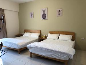 Voodi või voodid majutusasutuse Chiang Mi No.1 B&B toas