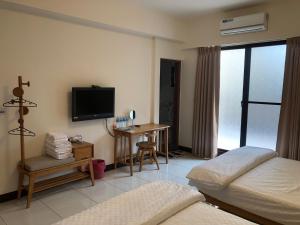Voodi või voodid majutusasutuse Chiang Mi No.1 B&B toas