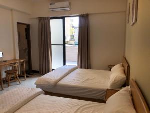Voodi või voodid majutusasutuse Chiang Mi No.1 B&B toas