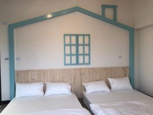 Voodi või voodid majutusasutuse Chiang Mi No.1 B&B toas
