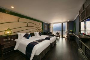 Postel nebo postele na pokoji v ubytování Pistachio Hotel Sapa