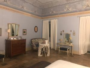 Postel nebo postele na pokoji v ubytování Palazzo De Fabritiis