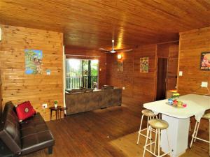 a living room with a couch and a table at Viewpoint Lodge & Safari Tours in Hazyview +83 photos