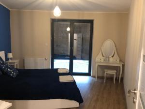 Posteľ alebo postele v izbe v ubytovaní Wislane Tarasy 2.0 by Atrium Apartments