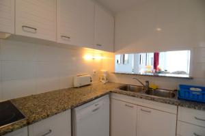 A kitchen or kitchenette at GREEN CLUB B 104