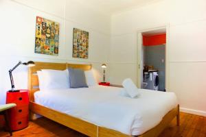 Katil atau katil-katil dalam bilik di Katoomba Falls Cottage