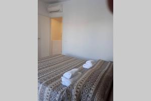 Łóżko lub łóżka w pokoju w obiekcie Villa Sapore di mare