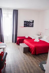 Posteľ alebo postele v izbe v ubytovaní Relais Cola Di Rienzo