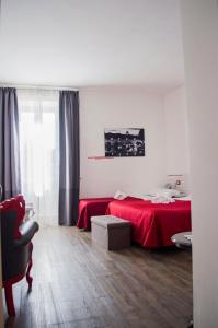Posteľ alebo postele v izbe v ubytovaní Relais Cola Di Rienzo