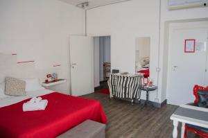 Posteľ alebo postele v izbe v ubytovaní Relais Cola Di Rienzo