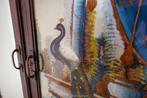 a painting of a statue of a bird on a wall at Zanzibar Palace Hotel in Zanzibar City