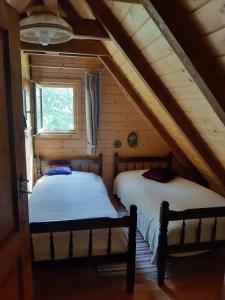 Tempat tidur dalam kamar di Jagdhütte Gammeringalm