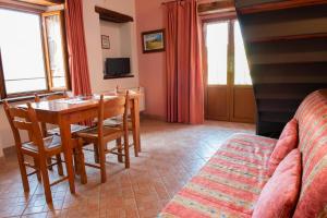 TV a/nebo společenská místnost v ubytování Ristorante Albergo Da Maurizio