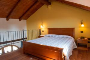 Postel nebo postele na pokoji v ubytování Ristorante Albergo Da Maurizio