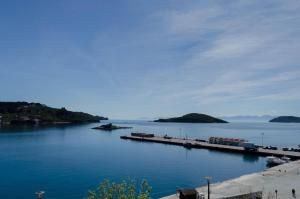 a large body of water with a dock in it at Pension Ververi in Skiathos