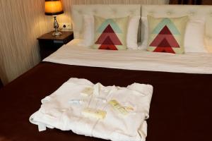 Кровать или кровати в номере De'Mar Hotel