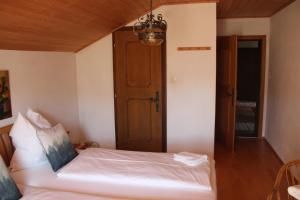 Postel nebo postele na pokoji v ubytování Köstlhof, Familie Hassler