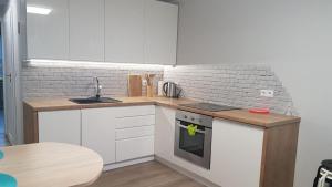 Η κουζίνα ή μικρή κουζίνα στο Apartament Świętoszów