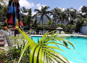 A piscina localizada em Amoreiras Hotel Pousada ou nos arredores