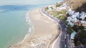 an aerial view of a beach with cars at Homestay coco in Vung Tau