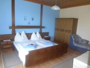Кровать или кровати в номере Gasthof Gangl