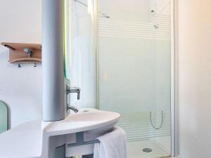 Koupelna v ubytování Ibis Budget Grenoble Sud Seyssins