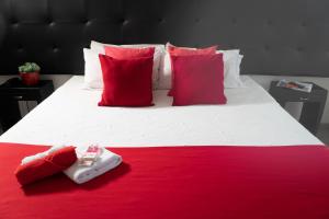 Postel nebo postele na pokoji v ubytování Hotel Metro 26
