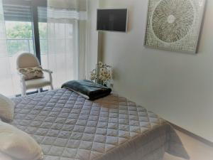 Postel nebo postele na pokoji v ubytování Apartamento de Luxo na Praia